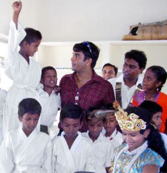 Star attraction: Actor Madhavan interacting with students of Gurukulam at Kovalam