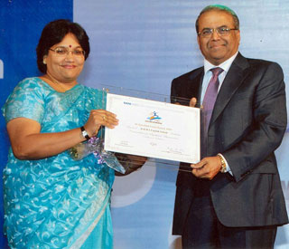 Receiving the Excellence in Education Award