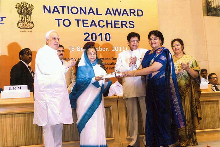 Mrs. Rajani Shekhar receiving the National Teachers Award 2010 from Mrs Pratibha Patil, President of India.